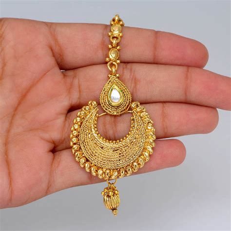 Choose from latest maang tikka and bridal jewellery collections. Buy Designer Fine Gold Plated Traditional Maang Tikka Jewellery Online