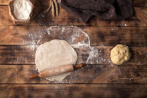 Roll Out Dough With Rolling Pin And Flour Stock Photo Image Of