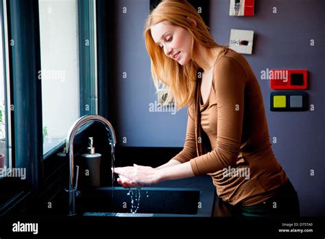 Woman Washing Her Hands Stock Photo Alamy