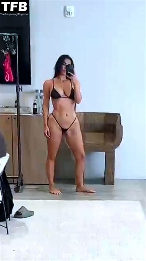 Kim Kardashian Shows Off Her Curves In A Micro Bikini Pics Video Thefappening
