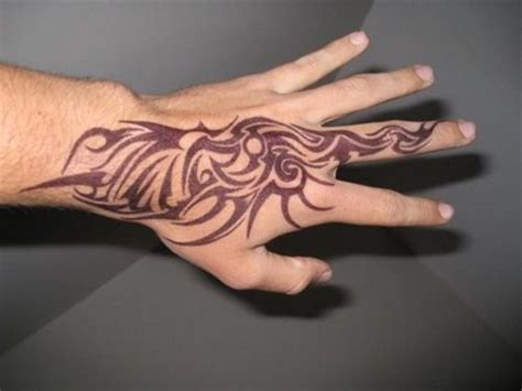 100 best tribal tattoo designs for men and women; 10 Tribal Hand Tattoos for Men | Tattoos Mob | Hand ...