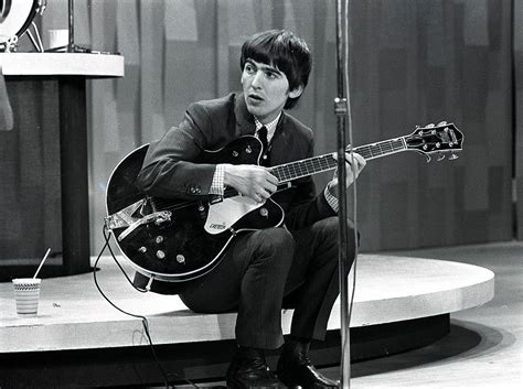 The Beatles 1964 Us Tour Guitarist Photograph By Popperfoto Pixels Merch