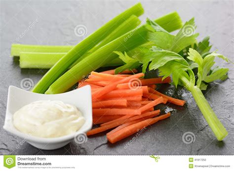Peel the carrots and cut into 8cm lengths. Julienne Carrots With Diced Celery Stock Photo - Image of ...