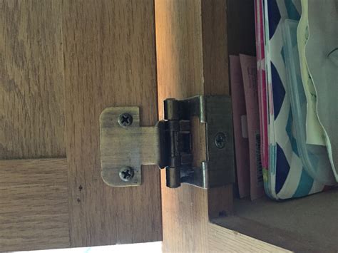 That means they show on the outside of the cabinet and have three screws on the inside plate. Cabinet door opening on it's own, how do I adjust this ...