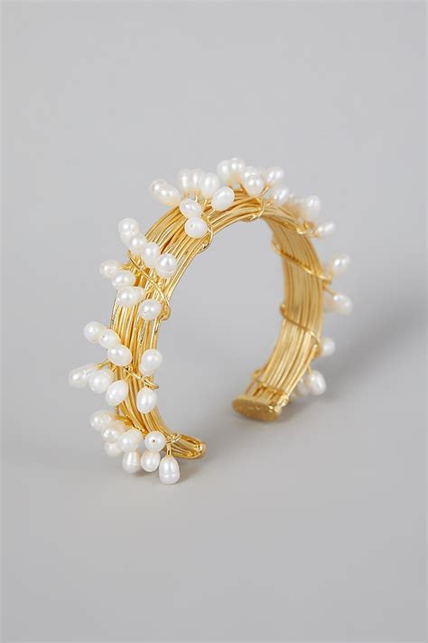 Gold Finish Pearl Hand Cuff Design By Rohita And Deepa At Pernias Pop