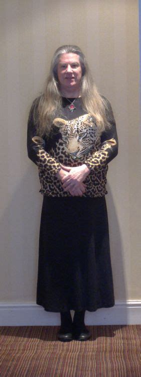 Wednesday Outfit Leopard Design Top Black Skirt Black Opaque Tights