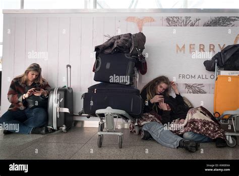 Passengers In The Terminal At Stansted Airport Where Up To 300 People Had To Spend The Night