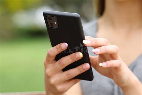 Woman Hands Close Up Using Smart Phone In A Park Stock Image Image Of