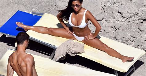 Nicole Scherzinger Shows Off Her Honed Bikini Body As She Flexes On The Beach With Beau Grigor