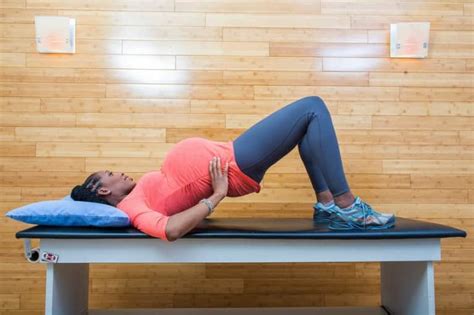 4 Stretches To Ease Back Pain During Pregnancy Mindbodygreen