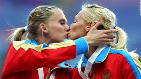 Russian Runners Kiss On The Winners Podium At Competition In Moscow Cnn