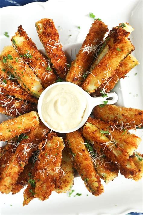 Plus, unlike the nutrient duds that are spuds, zucchini packs only 20 calories a cup. Parmesan Zucchini Fries Recipe - The Suburban Soapbox