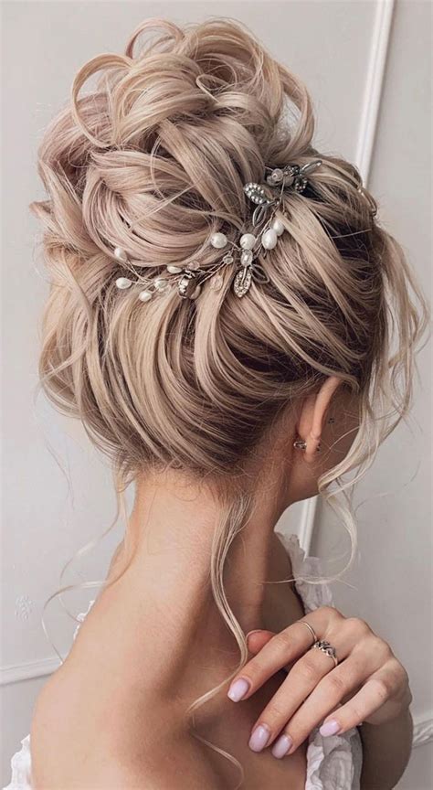 Updo Hairstyles For Your Stylish Looks In 2021 Textured High Bun Hairstyle