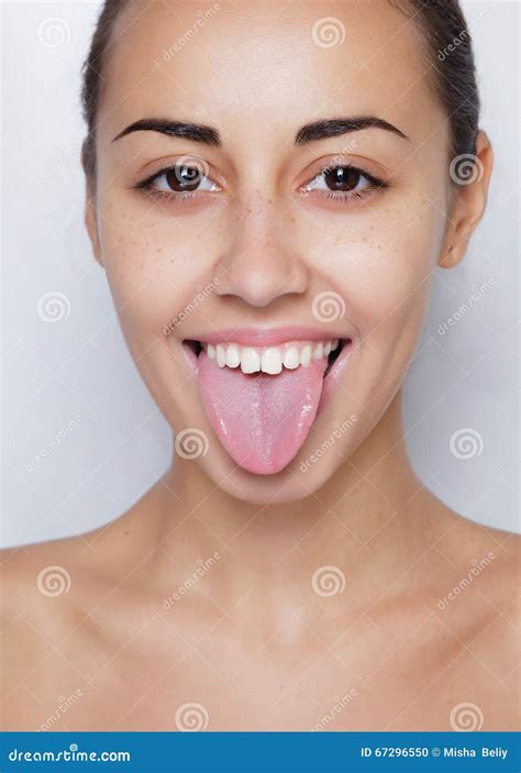 Beautiful Woman Sticking Out Her Tongue And Showing Young Piercing Royalty Free Stock Image