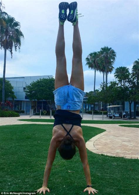 Model Erin Mcnaught Performs A Handstand In Skimpy Denim Shorts Daily