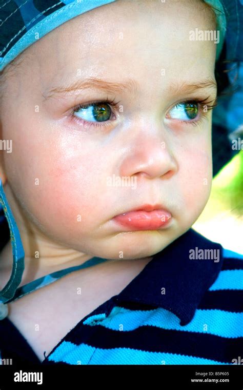 Pouting Boy Toddler With A Sad Face And A Frown Stock Photo Alamy