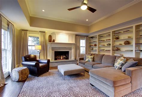 A round tray ceiling over a round dining room table will give your space the perfect look of beauty and symmetry. Beautiful leopard rug in Family Room Traditional with Tray ...