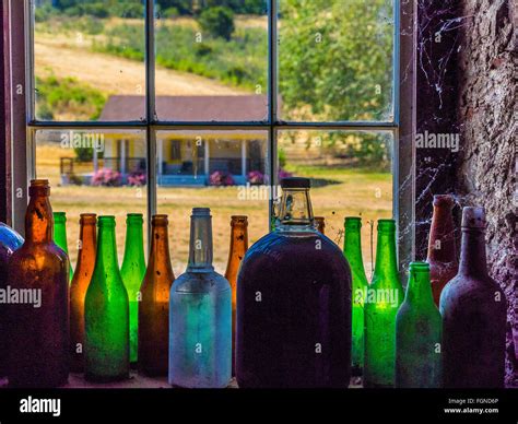 Colorful Bottles By The Window Sill Of A Stanton Ranch Building With