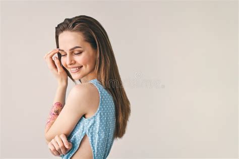 portrait of shy smiling beautiful woman looking down copy space stock image image of isolated