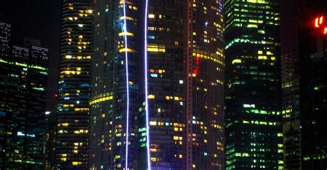 Photo Of High Rise Buildings During Night Time · Free Stock Photo