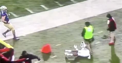 sideline worker gets knocked unconscious after terrifying hit during utah washington video