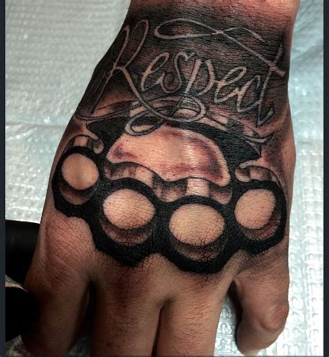 Brass Knuckle Hand Tattoo By Audrey Mello Knuckle Tattoos Hand