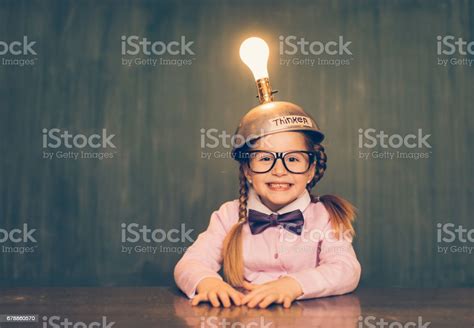 Young Nerd Girl With Thinking Cap Stock Photo Download Image Now