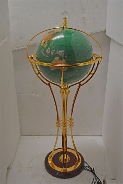 Illuminated Green Gold World Globe Rotated By A Motor Size 19 X