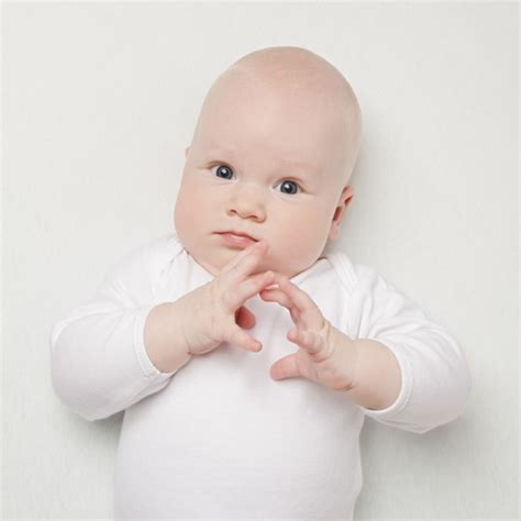 Premium Photo Portrait Of A Baby Closeup On White Background