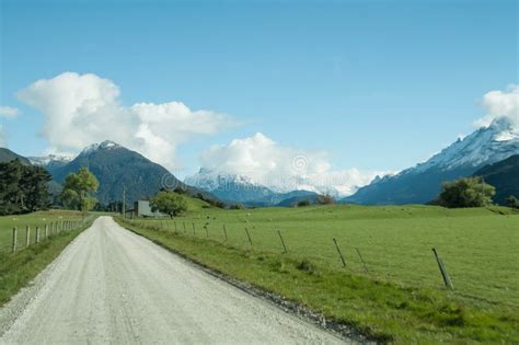 Glenorchy Road With Mountains In The Background In Queenstown Stock