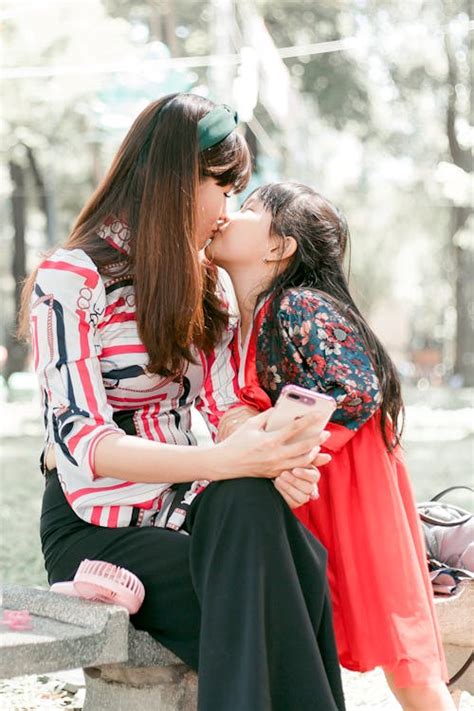 Girl Kissing Her Mother · Free Stock Photo