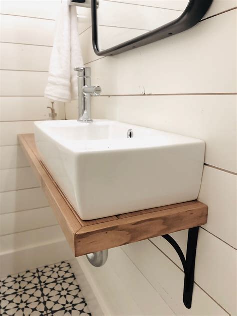 Wall Mounted Sink With Custom Shelf And Shiplap Walls Small Bathroom