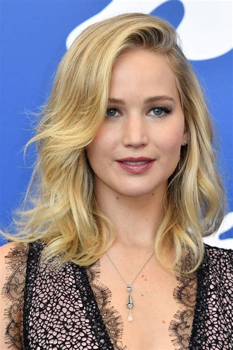 Jennifer Lawrence Wavy Light Brown All Over Highlights Hairstyle