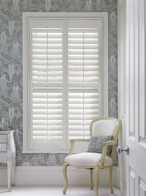 Vertical blinds are, as you might expect, a series of vertical slats (often made of a metal like aluminum) that hang from a track. shutters #VerticalBlindsCrownMolding # ...