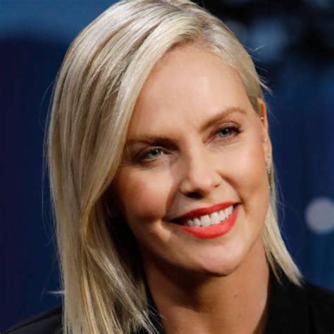 Charlize Theron Stuns In Swimsuit Under See Through Mesh Dress Teasing
