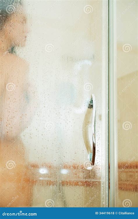 Woman Washing Behind Weeping Glass Shower Door Stock Photo Image Of Bathtub Natural