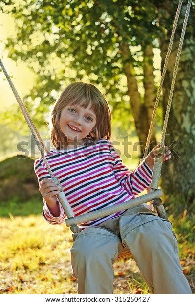 Little Girl On Swing Stock Photo 315250427 Shutterstock