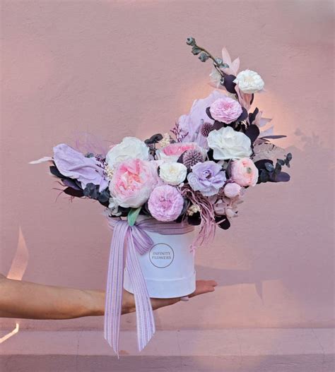 Beautiful Moon Flower Arrangement In A White Box Flower Shop Concept