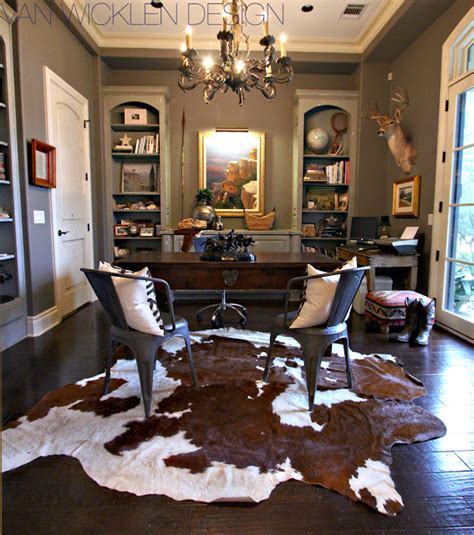 Cowhides Layered Over Natural Fiber Rugs Driven By Decor