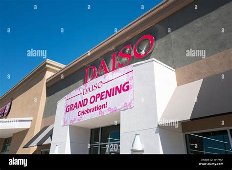 Grand opening of a branch of the daiso hi-res stock photography and