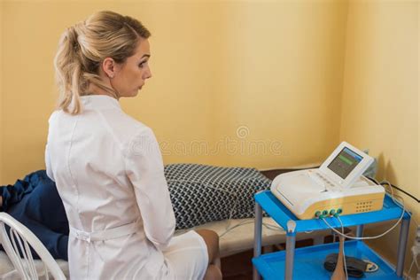 Gynecologist Does Colposcopy Procedure To Closely Examine Cervix