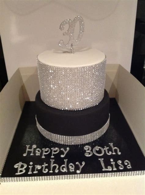 A Black And White Birthday Cake In A Box