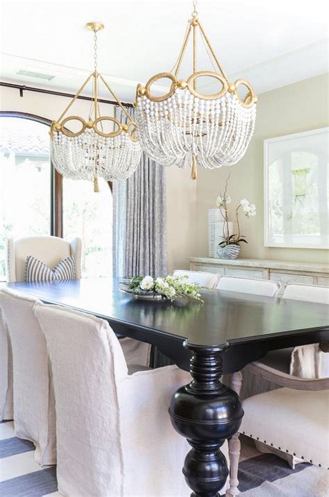 2 Chandeliers Over Dining Table