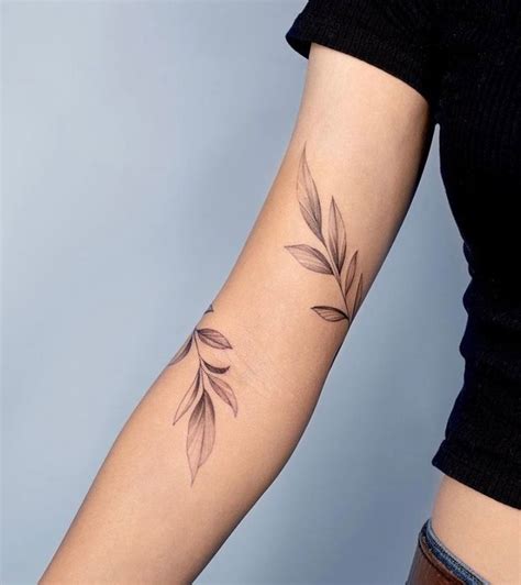 A Really Beautiful Leaf Tattoo On We Heart It Around Arm Tattoo Vine