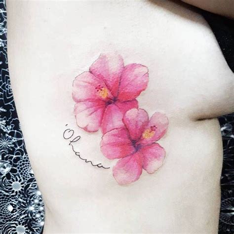 Hibiscus Flowers On The Right Side Ribcage Artista Tatuador Pablo