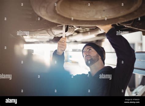 Mechanic Fixing A Car Stock Photo Alamy