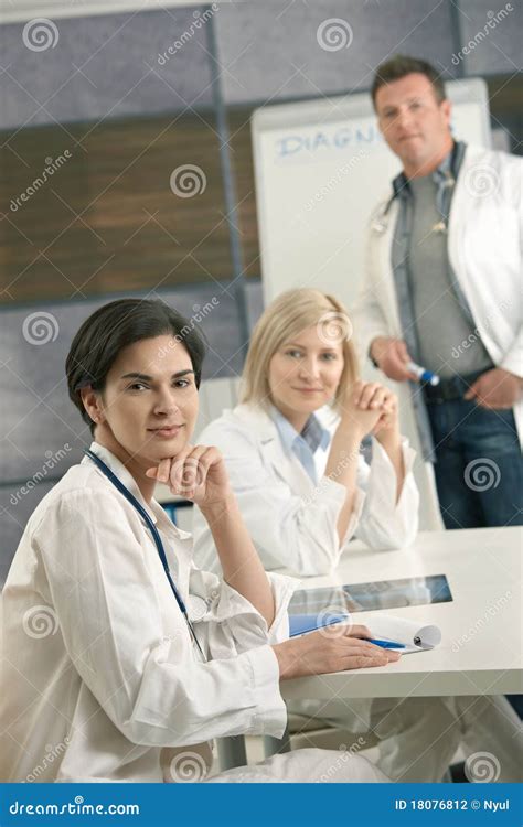Portrait Of Medical Team Consulting Stock Photo Image Of Doctor