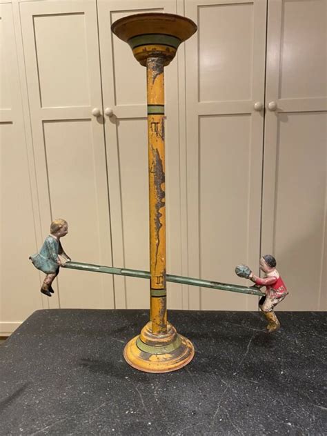 Antique Teeter Totter Handpainted Tin Toy Antique Price Guide Details Page