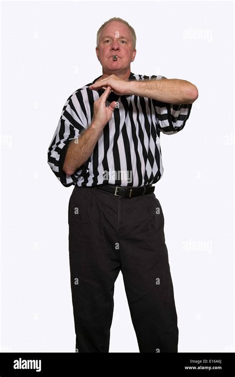 Man Dressed As A Basketball Referee Giving Signal For Technical Foul