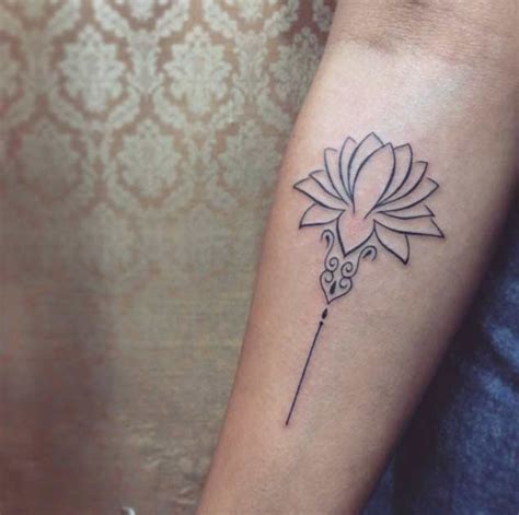 simple black ink forearm tattoo of cute flower tattooimages